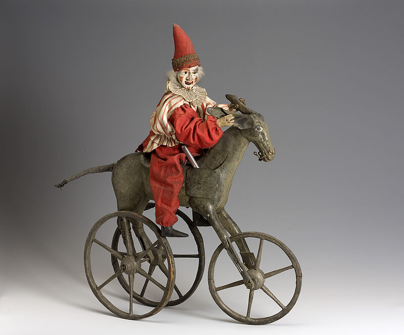 Christian Josef Tschuggmall, Figur "Clown (Bajazzo) auf Esel", um 1825