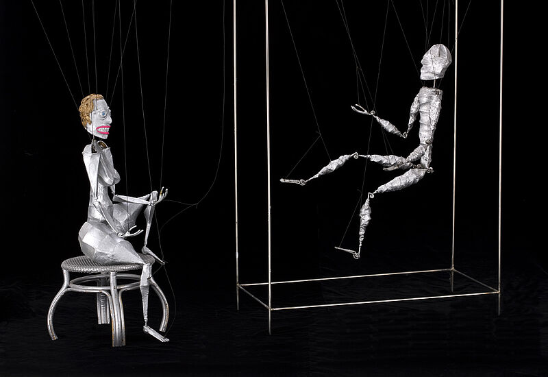 Ben Vornholt, Marionette „Mann“ in einem Gestell hängend montiert und mechanisch beweglich, frühe 1960er Jahre