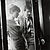 Barbara Niggl Radloff, Günter Grass [mit Ehefrau am Fenster rauchend, Blick nach unten], 1958